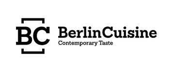 Logo von Berlin Cuisine; schwarzer Text auf weißem Grund