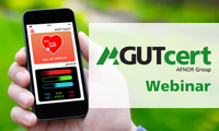 Gesundheitsapp auf Handy und GUTcert Logo