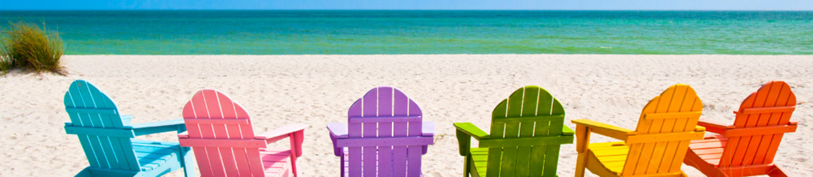 Colourful sun loungers on the beach